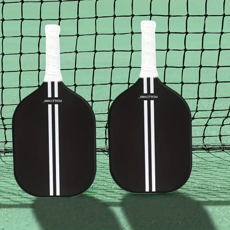 visuel raquettes sur terrain de pickleball
